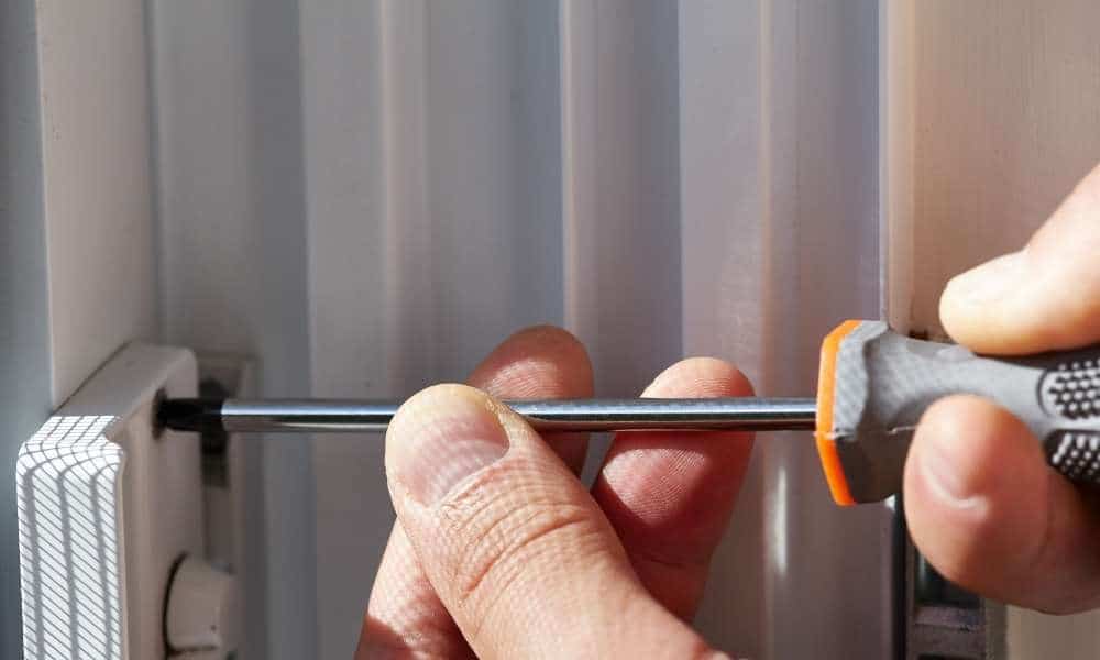Make Use Of A Small Screwdriver For Unlock A Bedroom Door